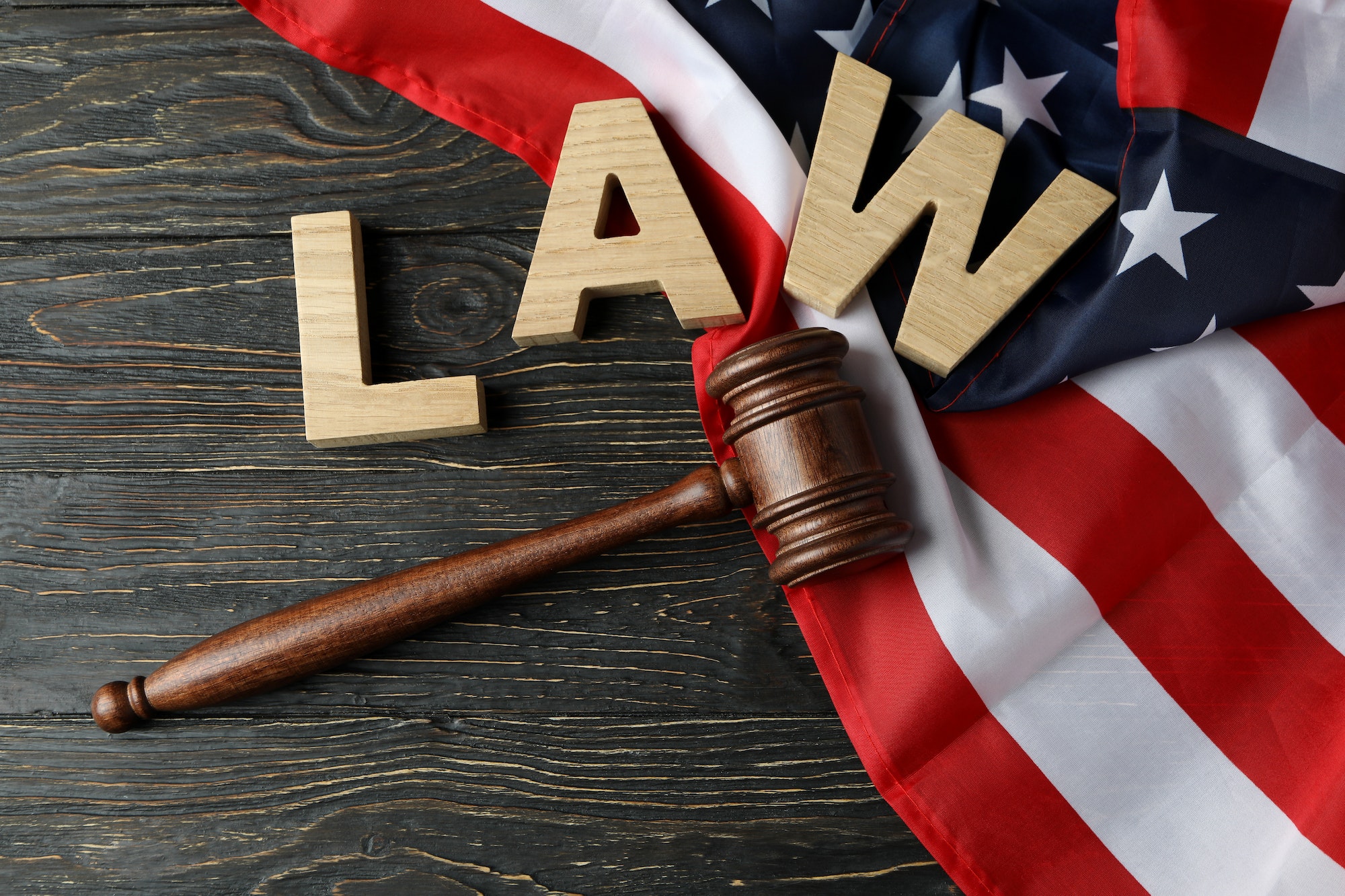 American law concept with judge gavel on wooden background