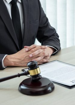 Male lawyer working with legal case document contract in office, law and justice, attorney, lawsuit